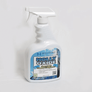 A bottle of toilet cleaner on the wall.