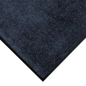Here's an alt tag for the image: Dark blue carpet corner detail.